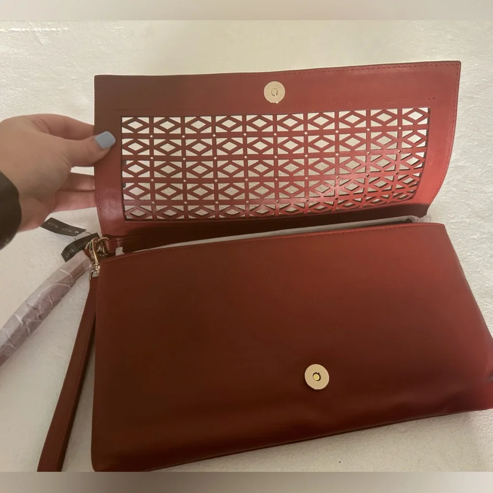 White House black market NWT rust wristlet purse lattice detail with duster bag